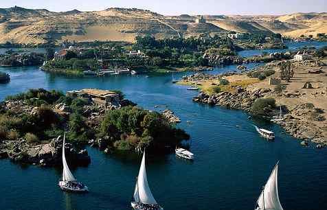 Day Four:  Fly to Aswan - Visit Aswan Attractions - Check In the Cruise